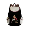 Canvas backpack detail showing the front floral letter A print and pockets design - Black Letter A Style