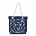 Detailed view of blue canvas tote bag with vintage floral pattern and thick rope handles. - Classical Vine Floral Style (ms3569)