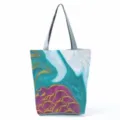 Close-up of the abstract teal and purple fluid pattern canvas tote bag with gold lines. - Blue Green Purple White Fluid Style (hl8976)