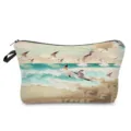 Close-up view of the watercolor beach and seagulls pattern on the makeup pouch detail. - Seagull Style (hz2160)