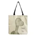 Vista detallada de bolsa tote de lona con bonito estampado de dinosaurio y texto elegante. - Estilo Dinosaurio Verde (hm3061)
