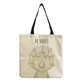 Vista detallada del bolso tote de lona con bonito estampado de dinosaurio y texto inspirador. - Estilo Triceratops (hm3062)
