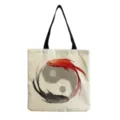 Close-up detail of the canvas tote bag featuring an artistic ink-wash yin yang fish print. - Ink Tai Chi Pisces Pattern (hm3524)