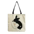 Canvas tote bag featuring a cute black and white rabbits cuddling print with black handles. - Snuggling Rabbits Style (hm3563)