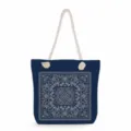 Blue canvas tote bag detailed view, featuring vintage white floral pattern and thick rope handles. - Retro Floral Geometric Print Style (ms3578)