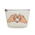 Close-up detail of a canvas cosmetic pouch with hand heart graphic and black zipper. - Gesture Heart Print Style (sn3357)