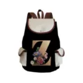 Close-up of canvas backpack featuring a decorative floral letter Z print and side pockets. - Black Letter Z Style