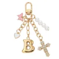 Portachiavi con lettera B dorata con croce, cuore, perle e ciondolo farfalla rosa. - Lettera B