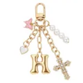Portachiavi elegante con lettera H dorata perle croce farfalla ciondoli da donna. - Lettera H