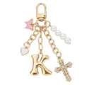 Portachiavi con lettera K dorata, croce in strass, filo di perle e ciondolo cuore. - Lettera K