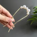 Elegant gold U-shaped hair fork with five white pearls for sophisticated styling - U-Shaped Hairpin Five Artificial Pearls Decor Style (2845)