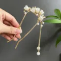 Elegant gold lily-of-the-valley hair fork with white pearl accents and long tassel - U-Shaped Buyao Lily of the Valley Artificial Pearl Tassel Style (2861)