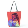 Canvas tote bag detail showcasing vibrant anime girl print and durable grey shoulder straps. - White-Red Anime Illustration Style (hlk0518)