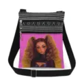 Detailed view of the crossbody bag featuring black white stripes and pink girl print pocket. - Style (xkk0781)