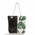 Large capacity canvas tote bag with black marble and tropical green leaves print design. - Black Marble and Leaf Patchwork (ms2014d)