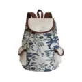 Canvas backpack detail featuring blue and white floral print and brown leather trim. - Blue And White Botanical Floral Style (sj3567)