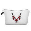 Detailed close-up shot of white cosmetic makeup bag featuring stylish red rose and black vine print. - Symmetrical Rose Style (hz4357)