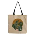 Tsanta tote apo kamva me monterna ektiposi fyto monstera, megali casual tsanta omou. - Στυλ Φυτού Μονστέρα σε Ρετρό Δίσκο (hm5085)