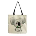 Τσάντα tote από καμβά με χαριτωμένο σχέδιο koala κινουμένων σχεδίων, λεπτομέρεια προϊόντος. - Κοάλα που τρώει μπαμπού (hm6783)