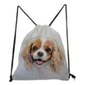 Detail view of lightweight canvas drawstring backpack featuring cute dog watercolor print. - Cavalier King Charles Spaniel Style (sk4417)