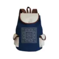 Classic blue canvas backpack with cream pockets and intricate front print for travel and school. - Symmetrical Geometric Square Print Style (sj3578)