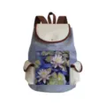 Close-up detail of the canvas backpack featuring art print, beige flap and functional side pockets. - Water Lily Oil Painting Style (sj4877)