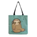 Vue détaillée du sac fourre-tout en toile de paresseux avec des notes mignonnes. - Bleu Écoutant de la Musique (hm6885)