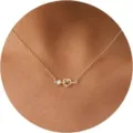 Gold necklace with sparkling cubic zirconia and heart knot pendant, elegant jewelry for women - Heart Bow Style / Gold