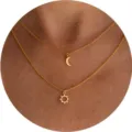 Gold layered necklace featuring delicate sun and moon pendants, perfect for chic daily style. - Double Layer Sun Moon Style / Gold