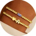Set di bracciali di perle dorate con cuore in zircone viola e lettera A gioiello da donna - Lettera A / Giugno