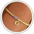Gold Beaded Initial Bracelet Featuring Purple Birthstone and Letter G Charm for Women - Letter G / Purple Rhinestones