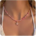 Graziosa collana girocollo con perline rosa e ciondolo stella marina stile spiaggia - Modello 5