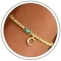 Gold bead bracelet featuring a green rectangular stone charm and initial letter C pendant. - Letter C / Green Zirconia