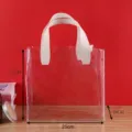 Premium transparent PVC gift tote bag with off-white handles and clear dimensions - L / Transparent / With Bow / Beige