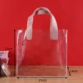 Elegant transparent PVC gift tote bag featuring durable pink handles, size 25x23x14cm - L / Transparent / With Bow / Pink