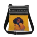 Stylish canvas crossbody bag with black white stripes, dual zippers, and cool girl graphic. - Black Girl in Yellow Jacket Style (xkk1422)
