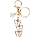 Elegante portachiavi in metallo dorato con ciondolo lettera T e farfalle di cristallo. - Lettera Buon Natale Stile B / Bianco