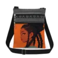 Detailed view of the lightweight crossbody bag featuring a stylish black girl art print and double zippers. - Orange Background Vivid Art Style (xkk1436)