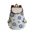 Canvas backpack featuring a stylish blue evil eye print pattern with durable brown straps and trim. - Evil Eye Details (sj2713)