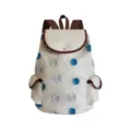 Close-up detail view of canvas backpack featuring blue eye pattern, brown straps and trim. - Blue Abstract Eye (sj2714)