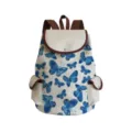 Detailed view of canvas backpack featuring blue butterfly print and brown straps. - Blue Butterfly Print (sj2718)