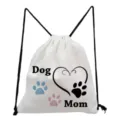 White canvas drawstring backpack with cute dog mom paw print design, casual travel daypack. - Dog Mom Heart Paw Mix Style (sk4385)