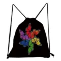 Detailed view of black drawstring backpack featuring vibrant colorful butterfly print design. - Radial Colorful Butterfly Print (sk4810)