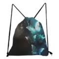 Close-up detail of the butterfly print drawstring backpack, showing the glowing blue art. - Glowing Blue Butterfly Print (sk4812)