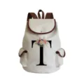 Canvas floral letter T backpack detail showing beige fabric and brown leather trim features. - Letter T Print Style (sj2477)