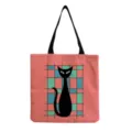 Close-up detail of the retro mid-century modern black cat print on canvas tote bag fabric. - Pink Vintage Black Cat Print (hm9283)