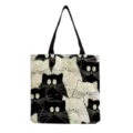 Detailed view of canvas tote bag featuring quirky black and white cartoon cat print. - Black and White Hand-Drawn Cat Print (hm9285)
