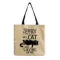 Close up of canvas tote bag with funny cat print and black shoulder handle detail. - Funny Black Cat English Slogan Print (hm9301)
