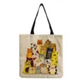 Detailed view of the cute cartoon cat print canvas tote bag, featuring sturdy black handles. - Colorful Cartoon Stacked Cats Print (hm9306)