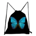 Detailed view of black drawstring backpack featuring a vibrant blue butterfly print pattern. - Black Base Blue Butterfly Print (sk4825)